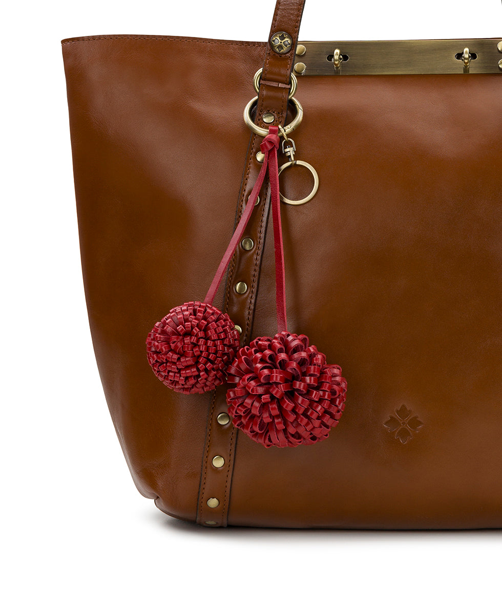Female - Pom Pom Bag Charm - Vintage Distressed Leather - rosewood - by Patricia Nash - View 6 of 8