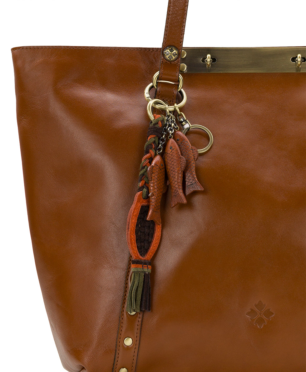 Female - 3 Wood Nordic Fish with Net Tassel | Bag Charms | Ochre, Chocolate, Olive - ochre, chocolate, olive - by Patricia Nash - View 3 of 3