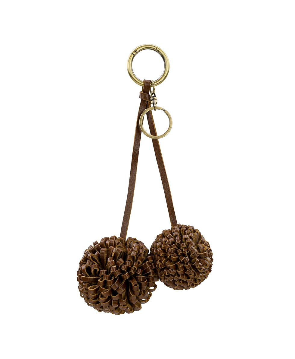 Female - Pom Pom Bag Charm - Vintage Distressed Leather - rosewood - by Patricia Nash - View 1 of 8
