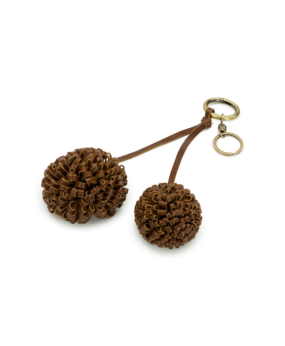 Female - Pom Pom Bag Charm - Vintage Distressed Leather - rosewood - by Patricia Nash - View 2 of 8