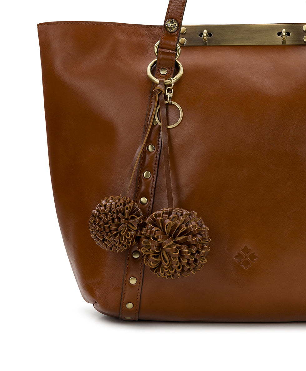 Female - Pom Pom Bag Charm - Vintage Distressed Leather - rosewood - by Patricia Nash - View 3 of 8