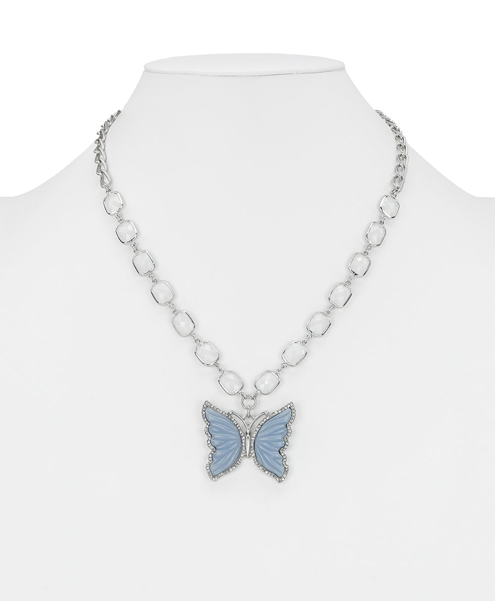Female - Large Butterfly Pendant Necklace - Blue Butterfly - worn rhodium - by Patricia Nash - View 2 of 3