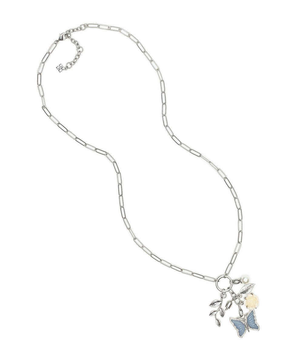 Female - Long Multi Charm Necklace - Blue Butterfly - worn rhodium - by Patricia Nash - View 2 of 3