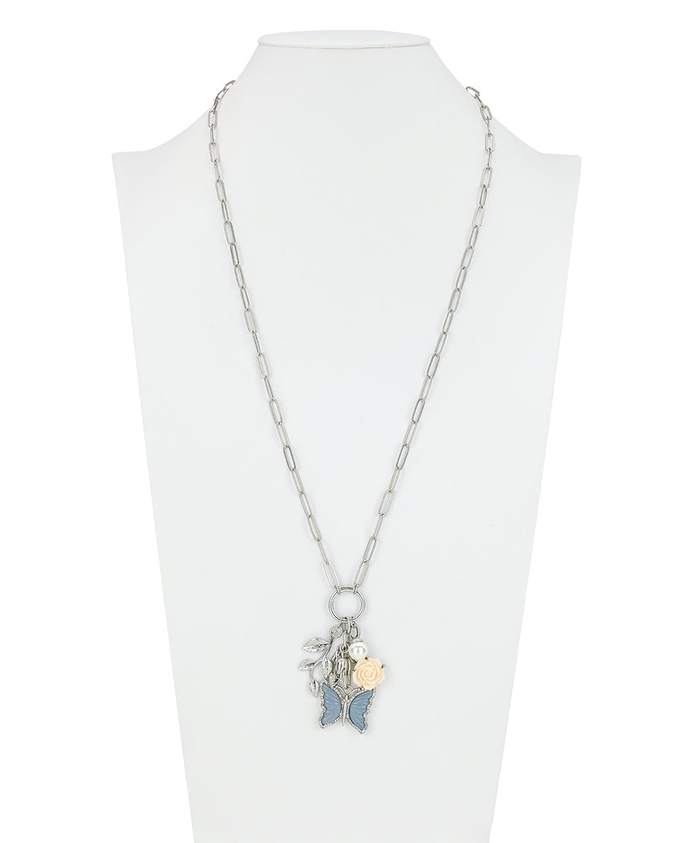 Female - Long Multi Charm Necklace - Blue Butterfly - worn rhodium - by Patricia Nash - View 3 of 3