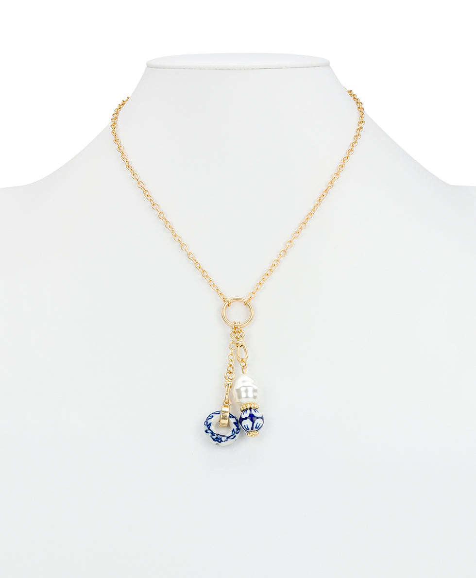Female - Double Charm Necklace - Blue Ceramic Collection - worn gold - by Patricia Nash - View 4 of 4