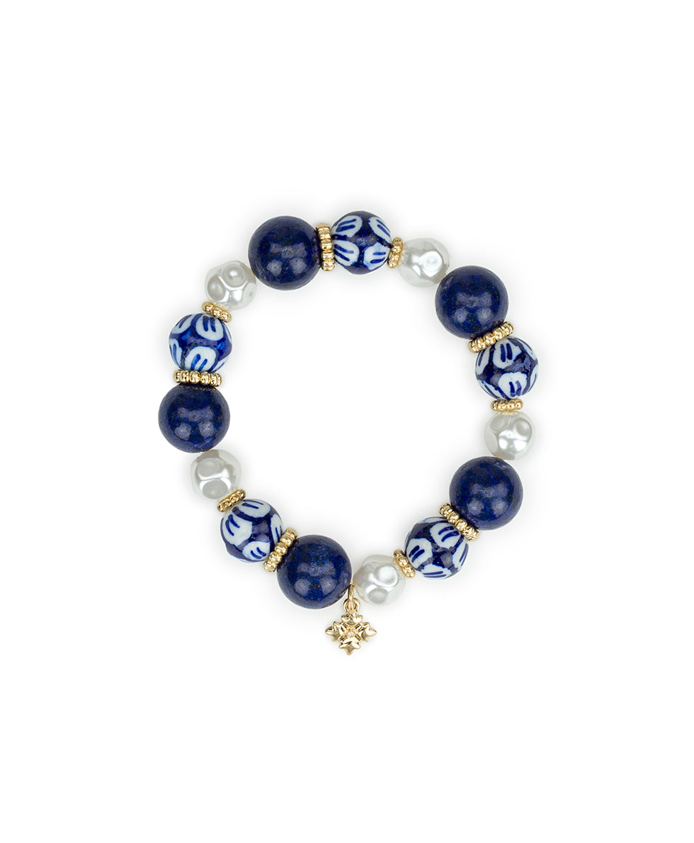 Female - Bead and Pearl Stretch Bracelet - Blue Ceramic Collection - worn gold - by Patricia Nash - View 1 of 5