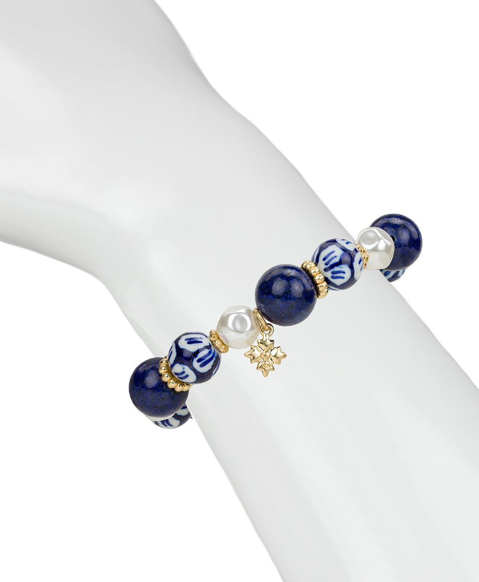 Female - Bead and Pearl Stretch Bracelet - Blue Ceramic Collection - worn gold - by Patricia Nash - View 4 of 5