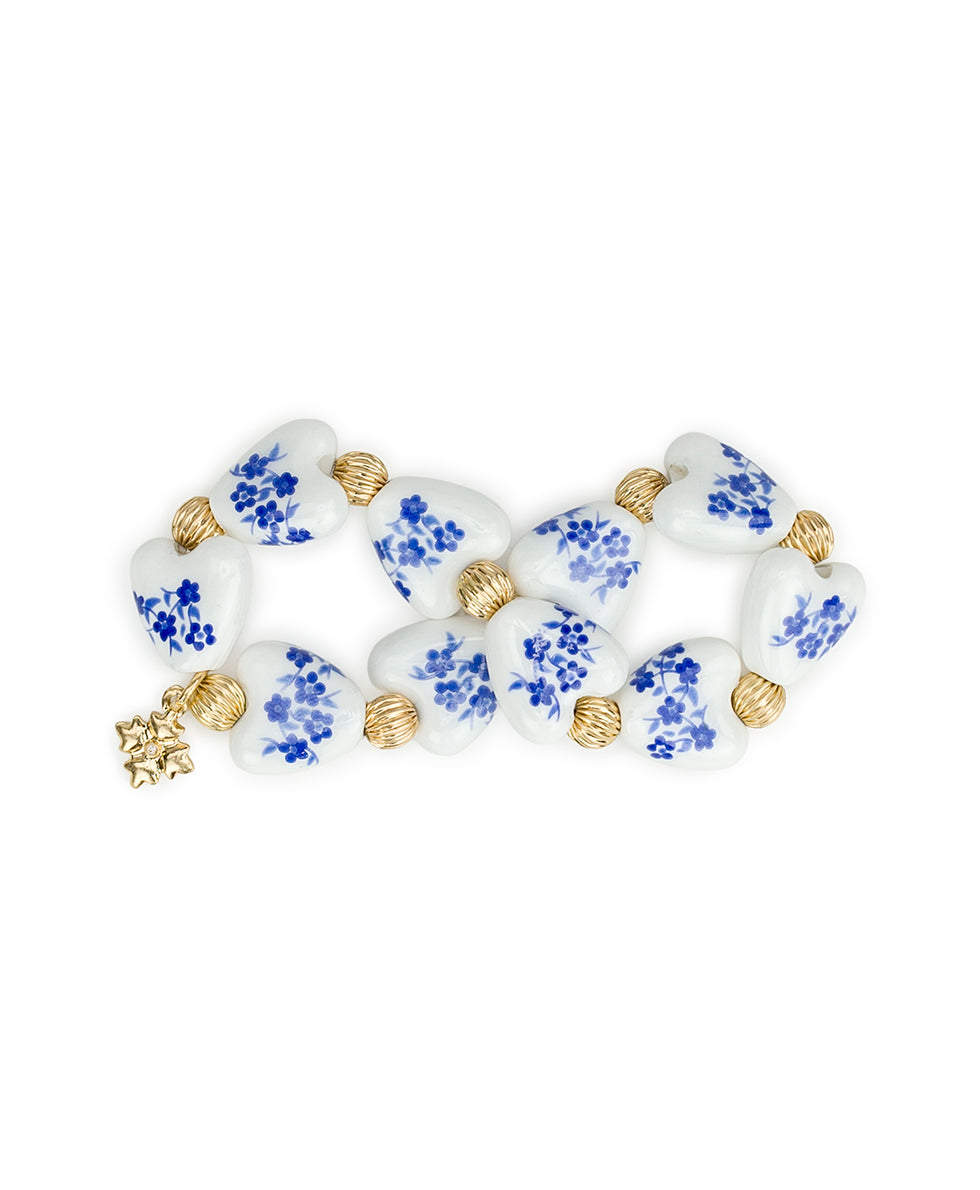 Female - Heart Stretch Bracelet - Blue Ceramic Collection - worn gold - by Patricia Nash - View 2 of 4