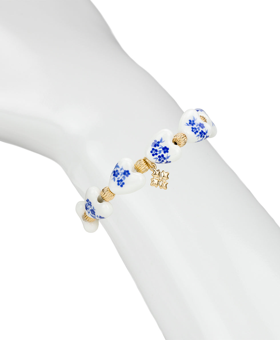 Female - Heart Stretch Bracelet - Blue Ceramic Collection - worn gold - by Patricia Nash - View 4 of 4
