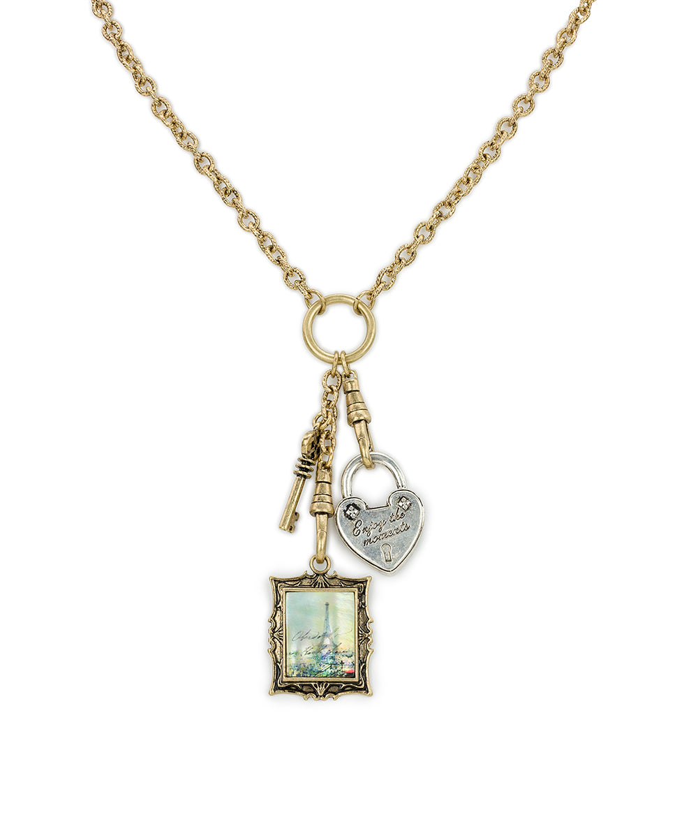 Female - Charm Dangle Necklace - Paris Postcard - worn gold/silver ox - by Patricia Nash - View 1 of 4