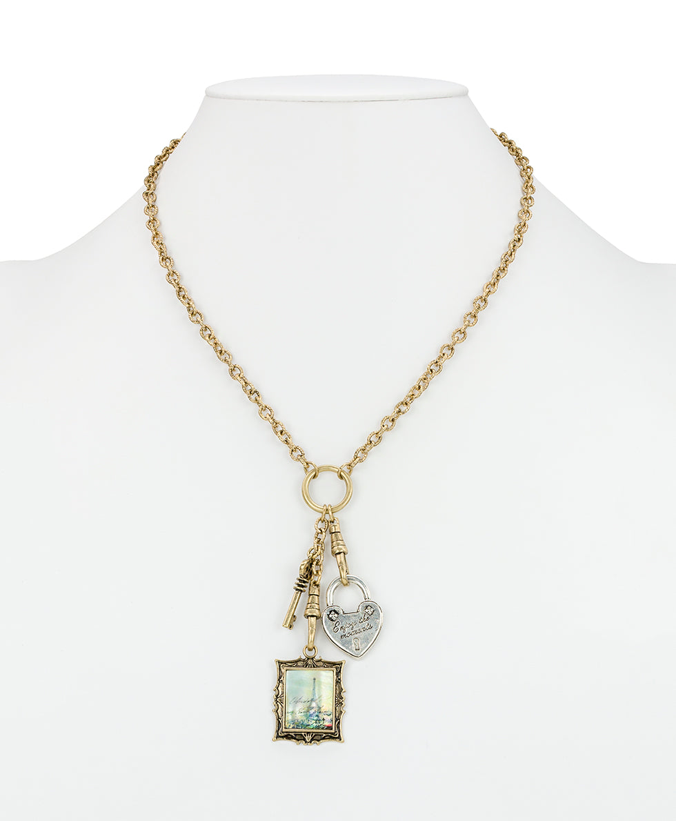 Female - Charm Dangle Necklace - Paris Postcard - worn gold/silver ox - by Patricia Nash - View 4 of 4